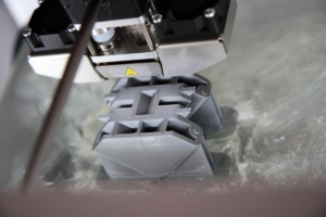 plastic 3D object beneath printhead